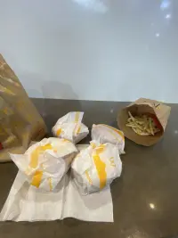 Order screen showing free McDonald's items acquired through automated checkout.